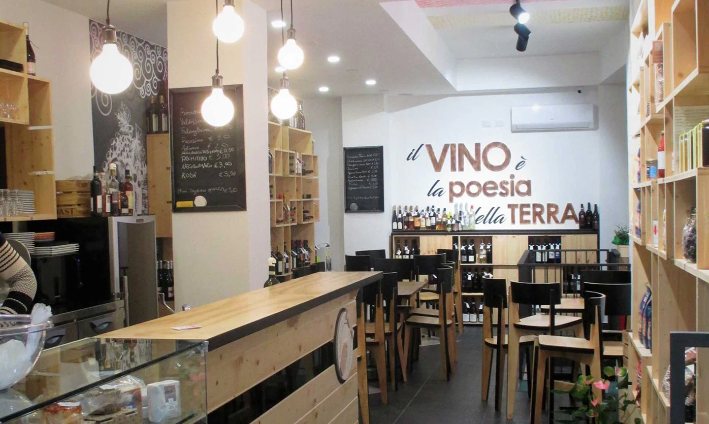 Restaurant fit-out with wooden furniture and lettering