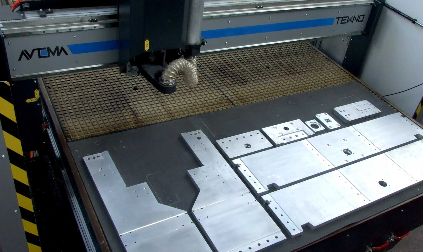 Aluminium plates machined for customised production kits
