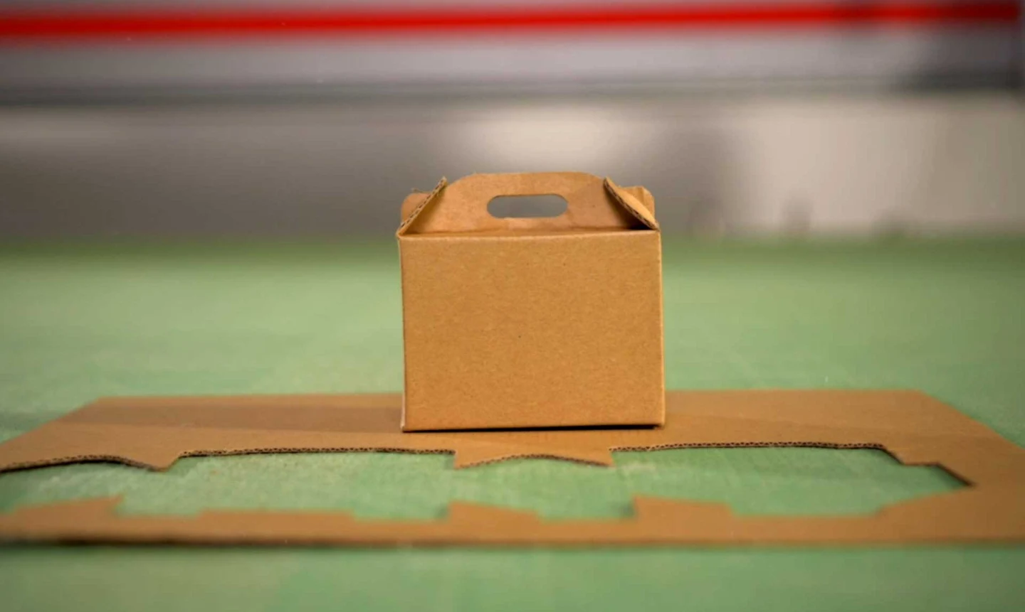 Custom cardboard box made by cutting and creasing