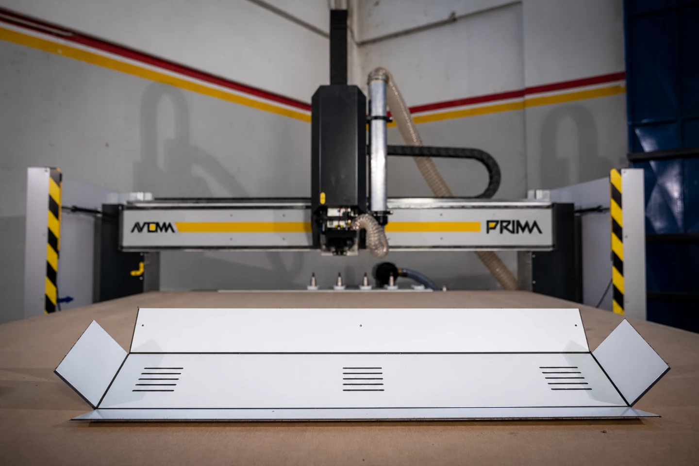 A routed and folded Dibond box section on the machine