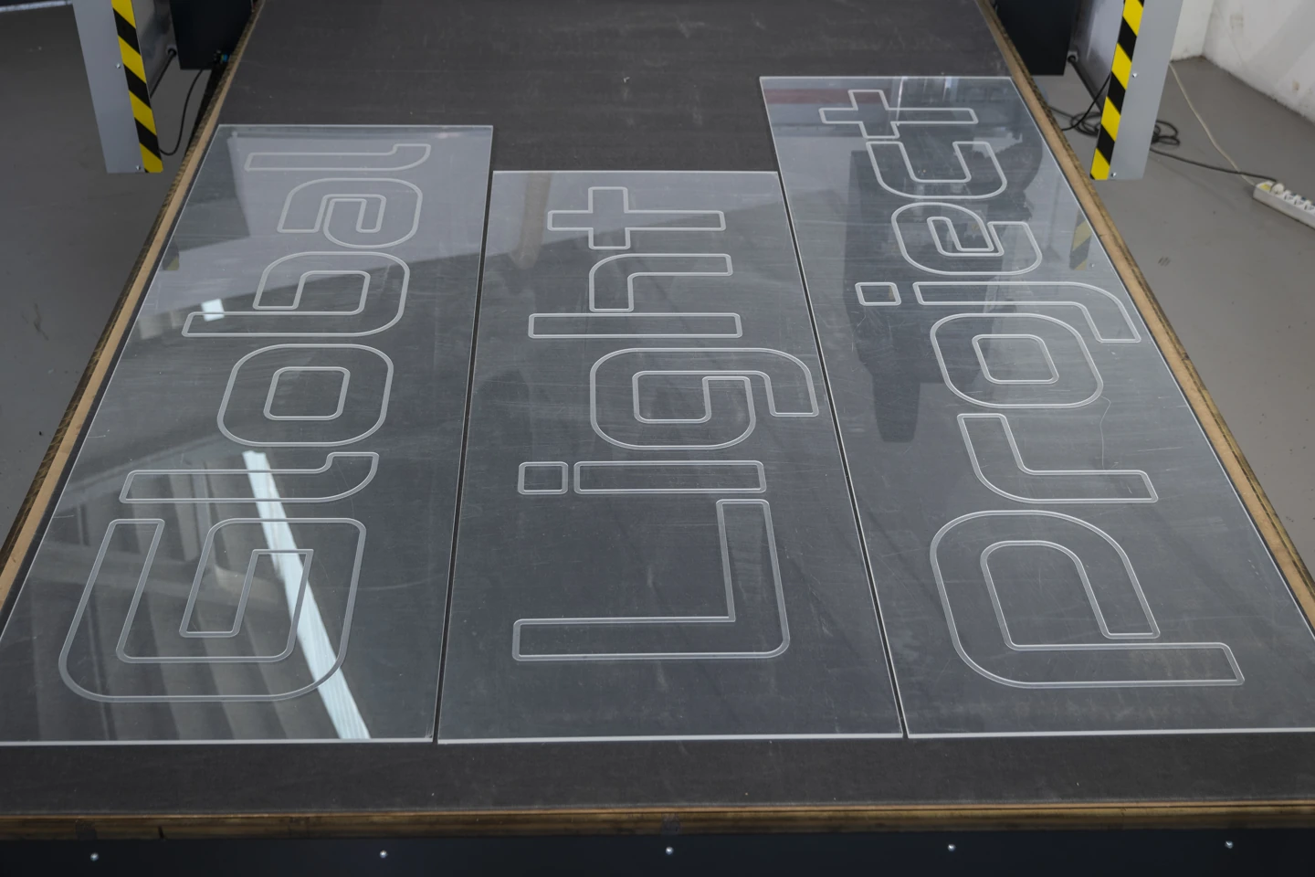 PRIMA machining an acrylic sign